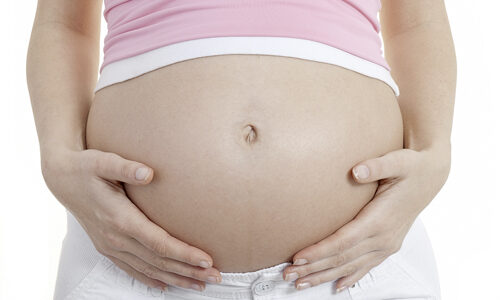 По какой причине колит внизу живота при беременности?